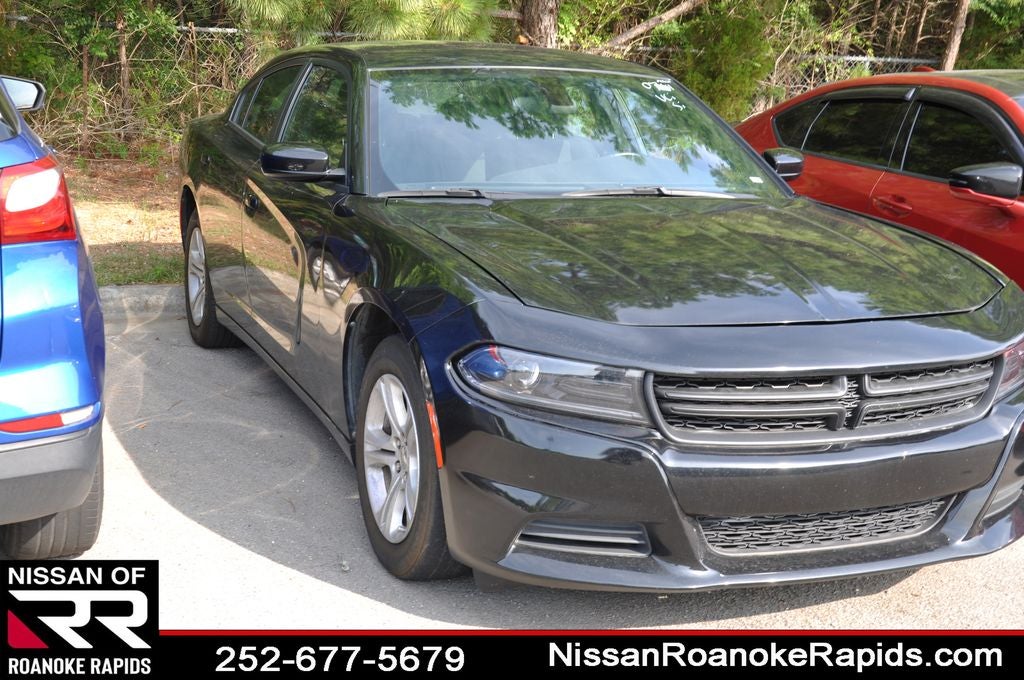 2022 Dodge Charger SXT in Pitch Black Clearcoat — front three-quarter view