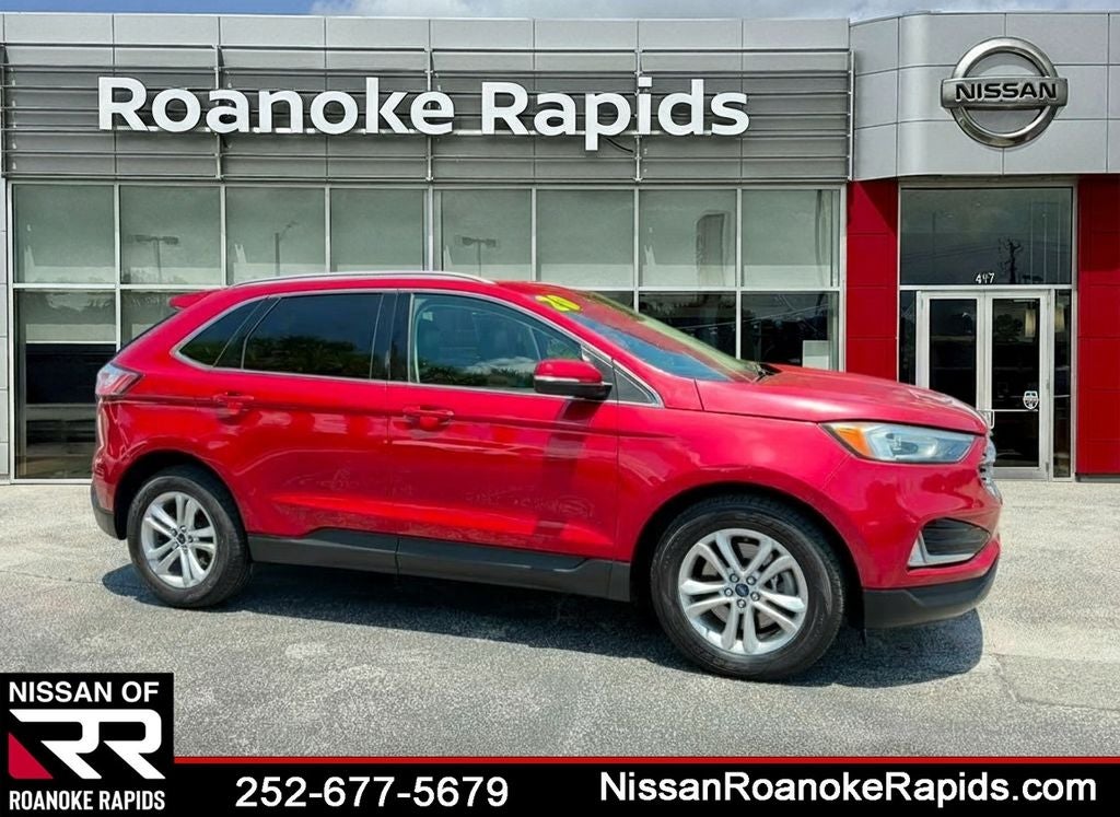 2020 Ford Edge SEL in Red Metallic — front three-quarter view