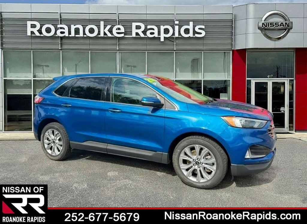2024 Ford Edge Titanium in Blue Metallic — front three-quarter view