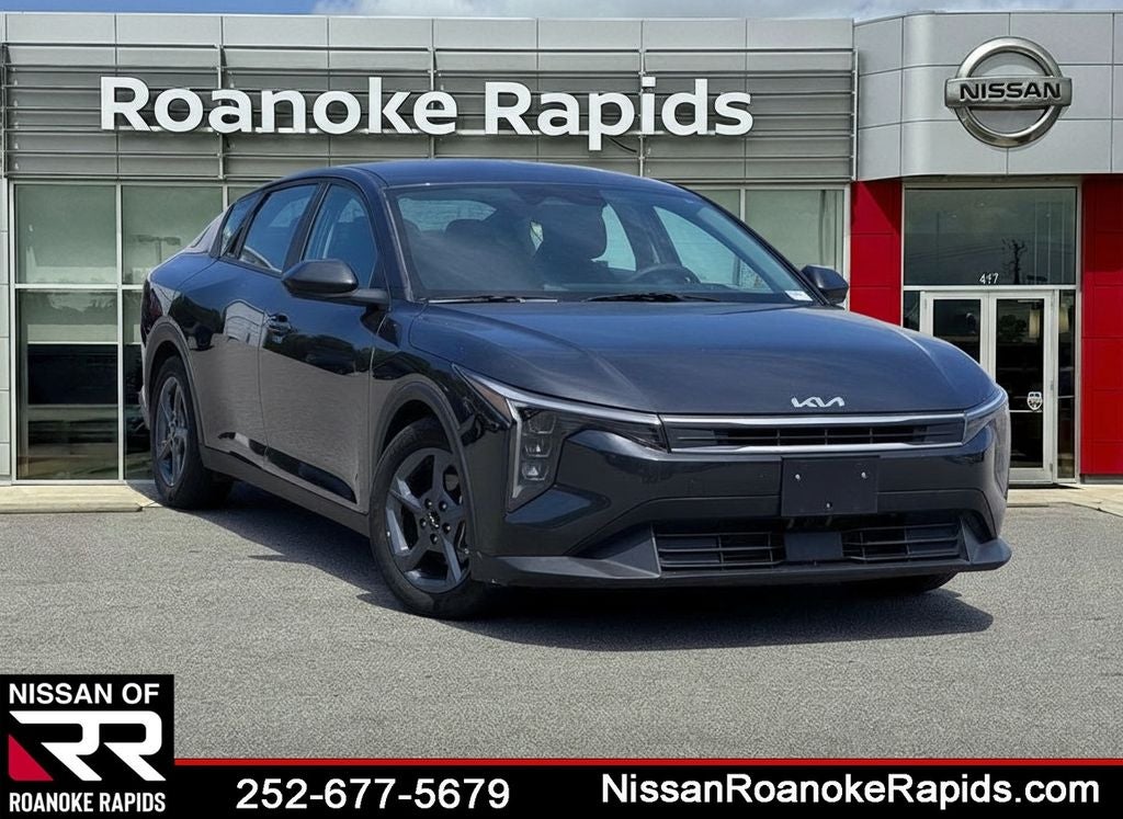 2025 Kia K4 LXS in Interstellar Gray — front three-quarter view